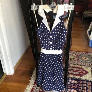 Haltertop, navy dress with white polka dots.